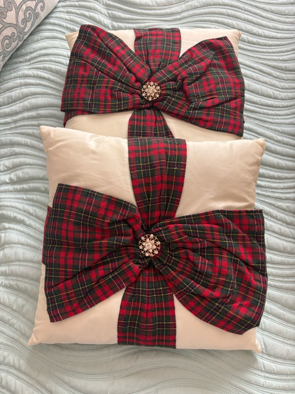 Cream Holiday Pillows with Red & Green Plaid Bows
